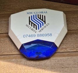 Burglar Alarm Installation alarm box with MW Global branding.