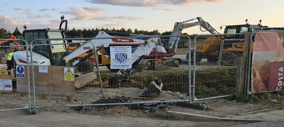 Construction site security by MW Global Security, signage on site perimeter.