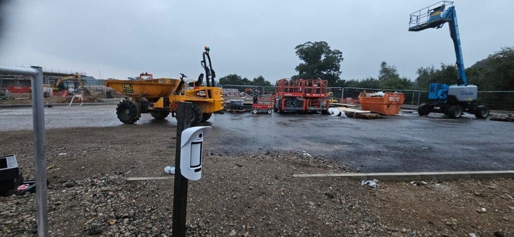 Cambridge construction site security with machinery, fencing and site protection signage