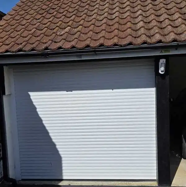 Ajax MotionCam Outdoor alarm installation protecting a residential property in Cambridge